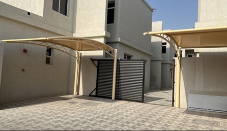 Hostel exterior and parking area